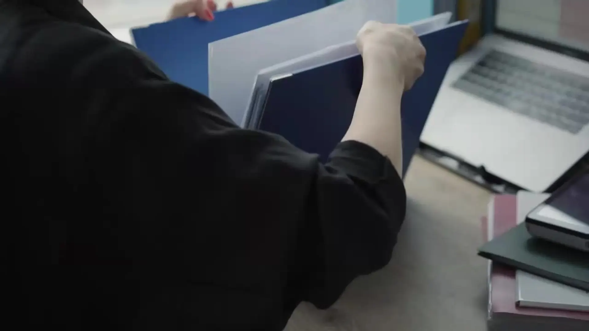 Paperwork moving through a box plant office